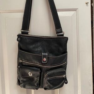 Roots Pebbled black leather crossbody bag, Venetian Village